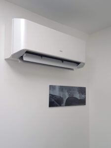 White air conditioning unit installed in a gym by PRA Air Conditioning Engineers