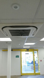 Ceiling mounted ac unit installed by PRA Air Conditioning engineer