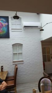 Air conditioning unit installed in a cafe by PRA Air Conditioning Engineers