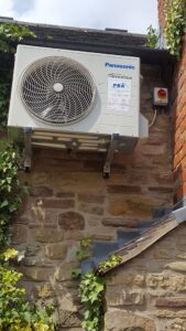 A Panasonic outdoor wall mounted unit installed for a country cottage
