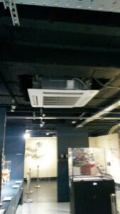 A ceiling mounted unit installed by PRA Air Conditioning