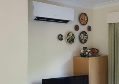 White air conditioning unit installed in a house by PRA Air Conditioning Engineers